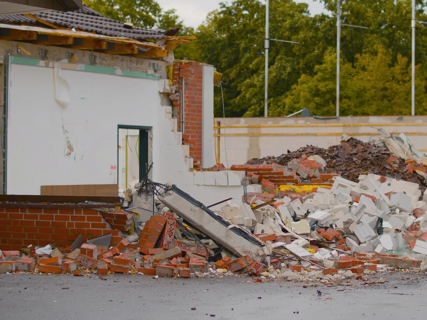 Construction debris pile with broken bricks and demolition waste from a renovation site